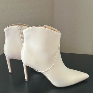 Elegant Express White Ankle Boots